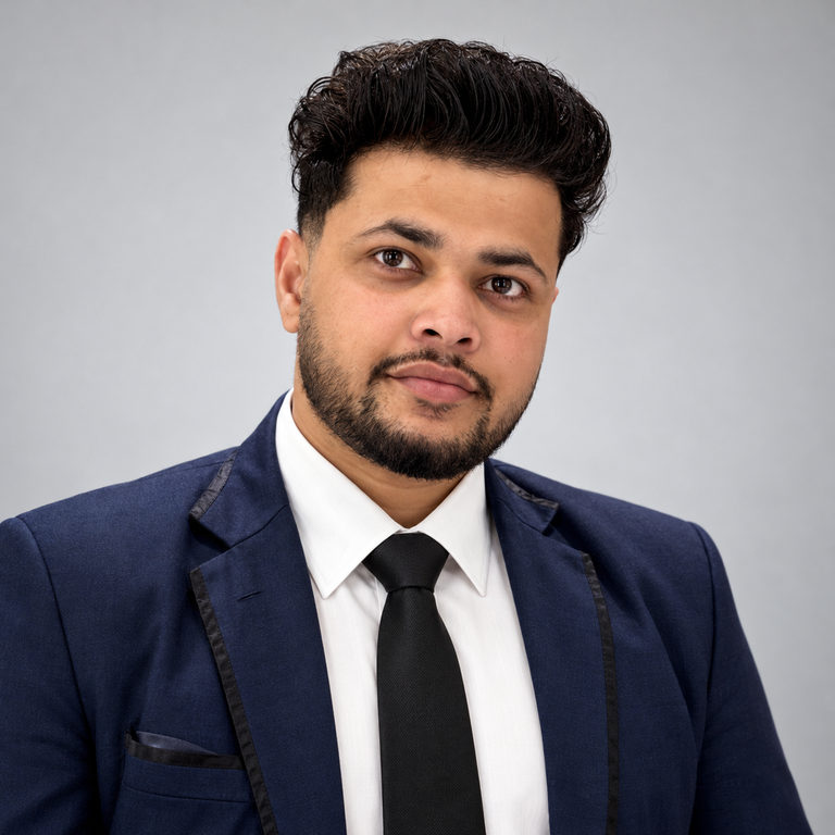 Subash Kafle professional headshot in a navy suit